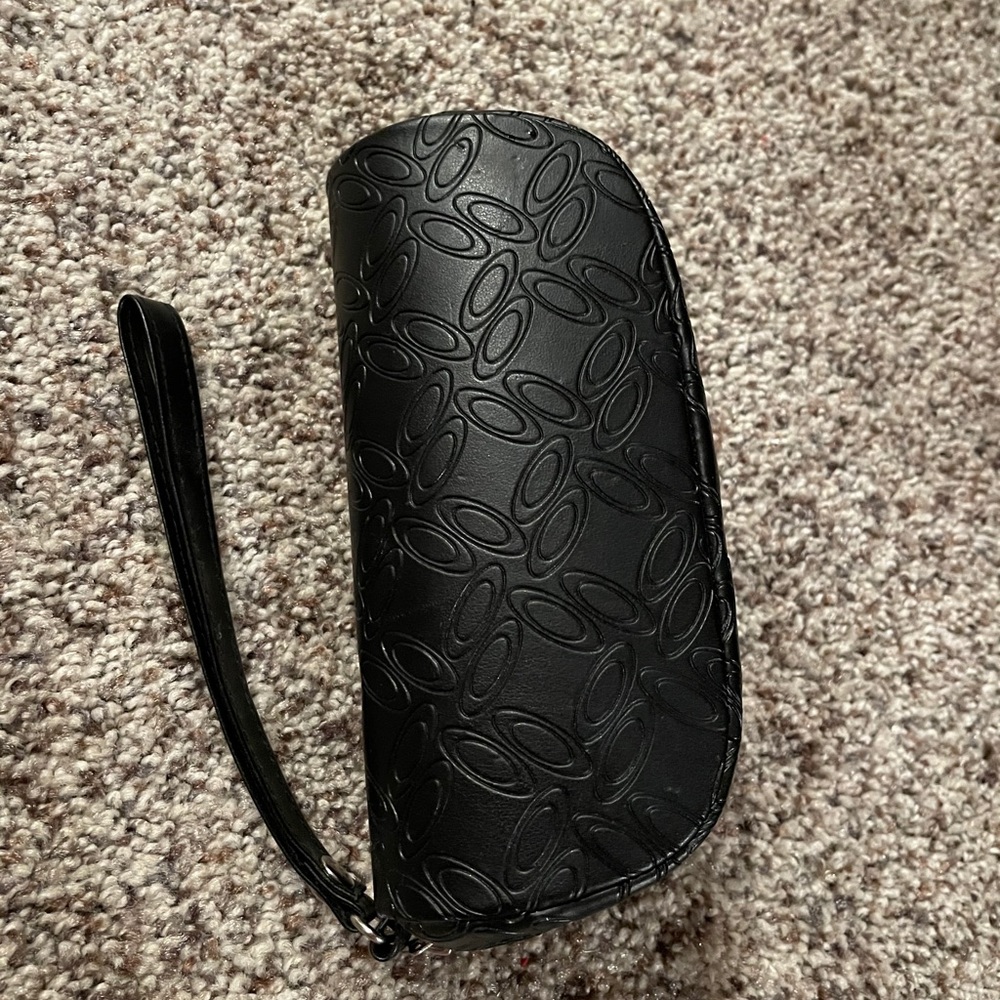 Black OAKLEY Sunglasses hard case with pink sleeve